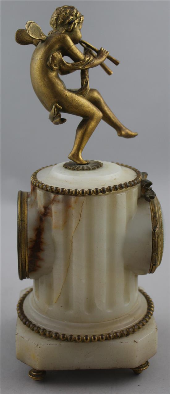 An early 20th century French ormolu mounted alabaster timepiece, 9.5in.